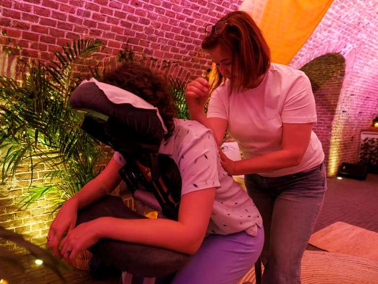 Aromatherapy essential oils displayed for a sensory chair massage experience using dōTERRA oils.