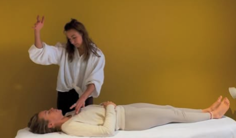 An attendee receiving a 15-minute event massage to release tension and restore energy.