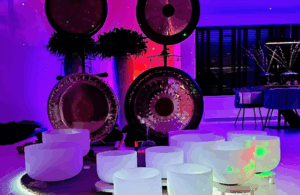 Sound bath experience at an event with crystal singing bowls creating deep relaxation and calm